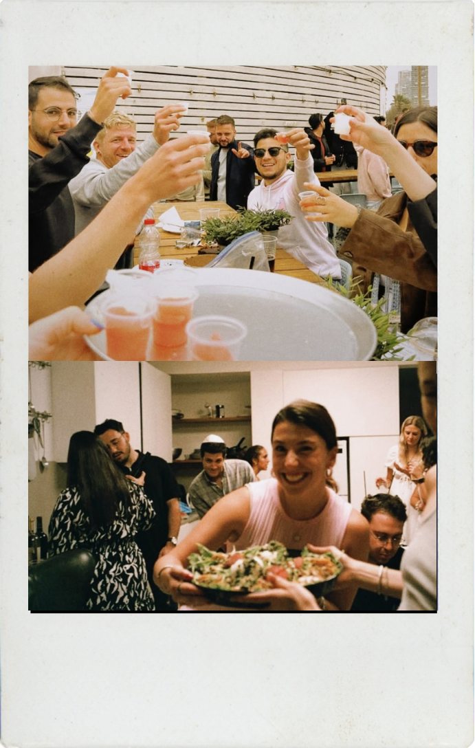 friends toasting drinks and sharing a salad at a lychi event